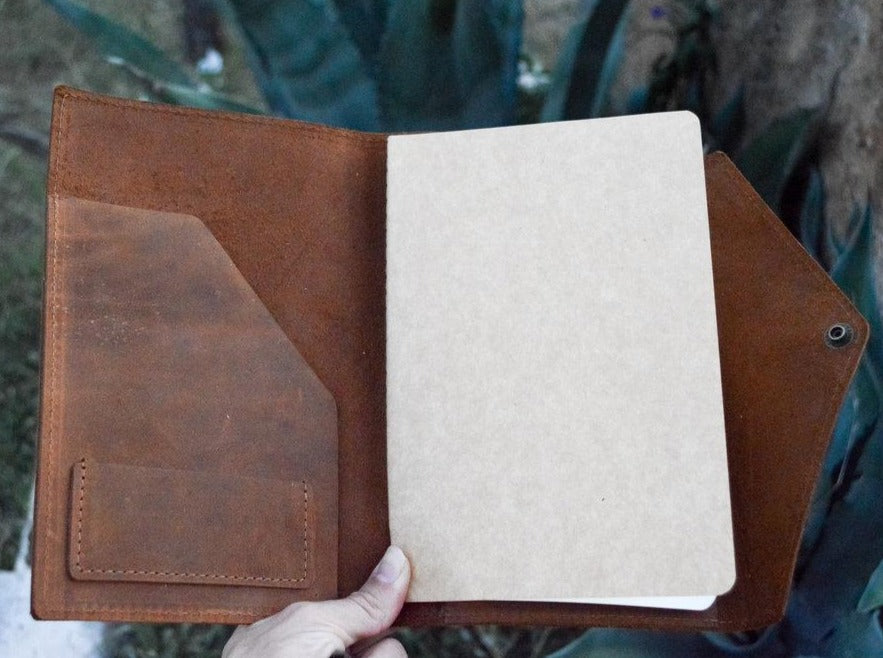 The San Gabriel is slim and minimalist in design. Made to hold the essentials.   Available in Large and small sizes  LARGE Dimensions: 9” x 6“ for A5 Moleskin notebooks   SMALL Dimensions: 4”x 6” for A6 size notebooks  Personalize it and make it the perfect gift.   Handmade in Austin, Texas!