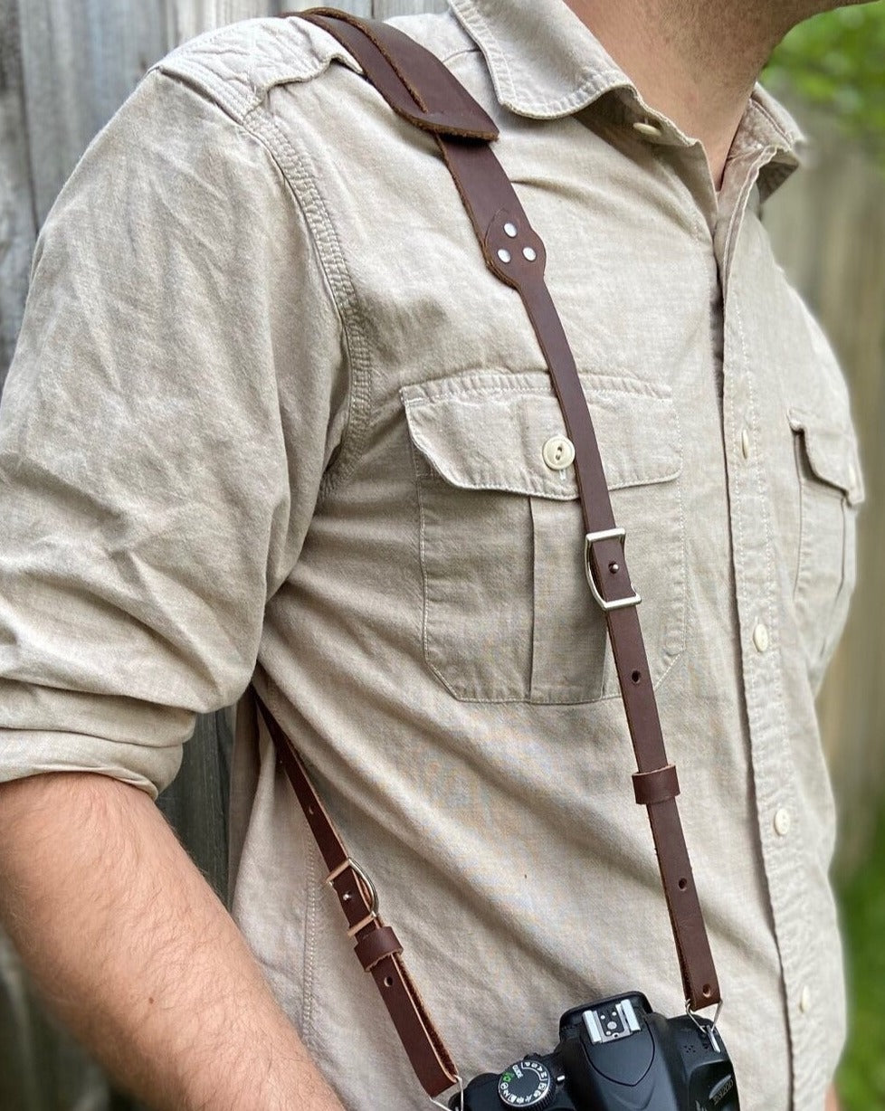 The Bates leather camera strap is the perfect addition for your camera gear.  Features conway hooks, making it easy to adjust to a comfortable length.   Made from full grain leather.   Hand made in Austin, TX!