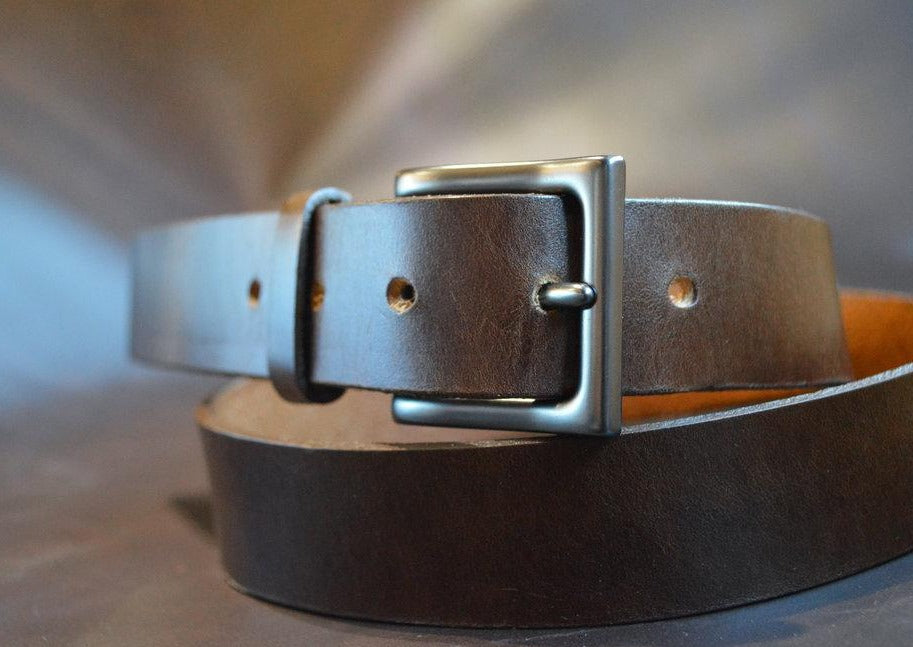 Our men’s chestnut brown dress belt is made from full grain bridle leather.  It’s the perfect ensemble for any special occasion.  Once you own a full grain leather belt, you will never go back.  Handmade in Austin, Texas!